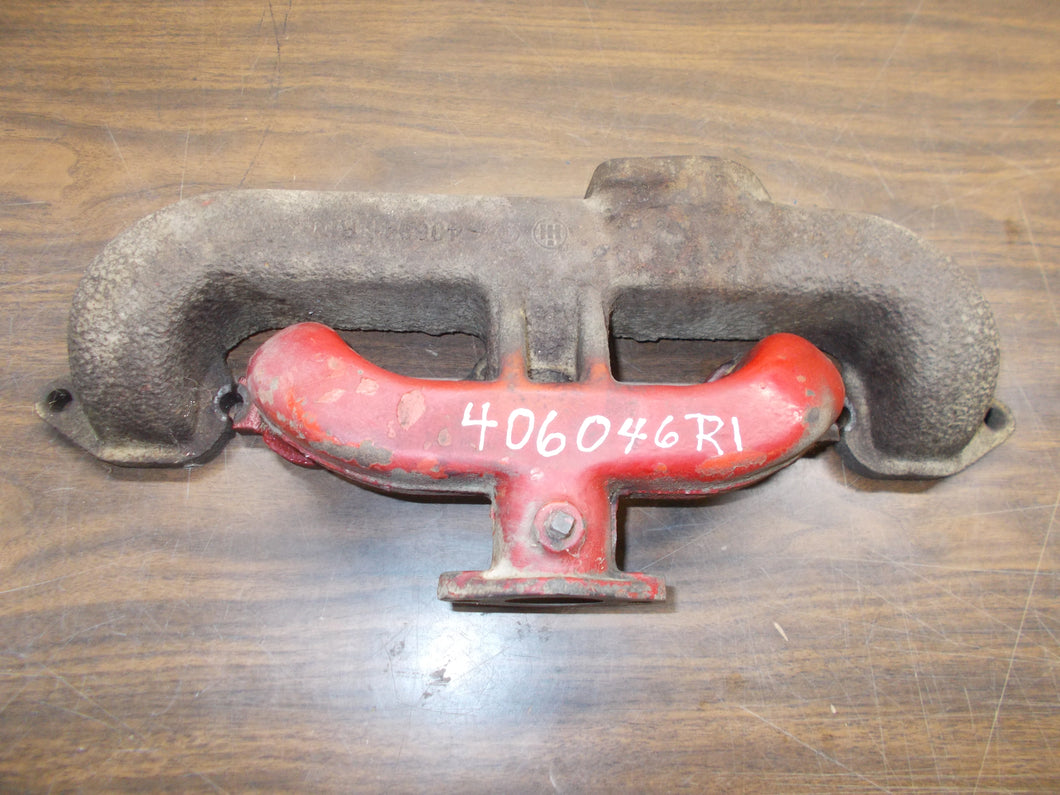 406046R1 CASE I/H TRACTOR MANIFOLD 454,464,574,674,2400A,2400B,2405B. USED
